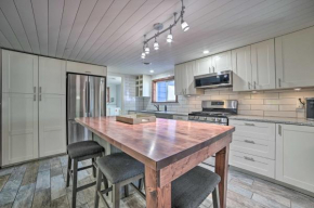 Prudenville Retreat with Yard about 1 Mi to Lake!